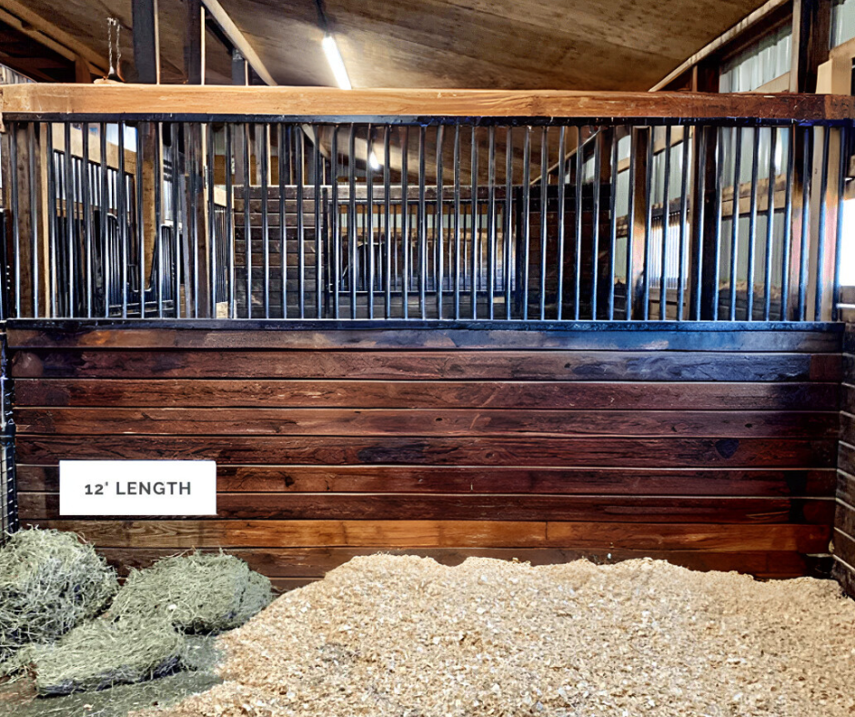 A pony looking through the Horse Stall Grill Divider - 8' Length