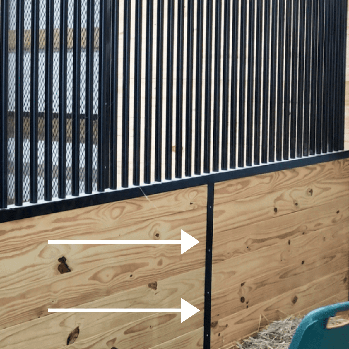 Grilled Stall Front with lumber fill. A full privacy wood partition and stall fan. Stall flooring features a stable comfort mattress — a wall-to-wall waterproof stall mat system. 